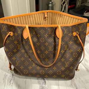 Louis Vuitton Neverfull purse, under a year old still in original box.